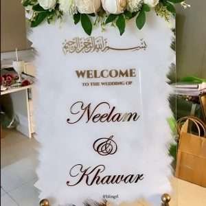Welcome Board in White and Gold With White Flowers